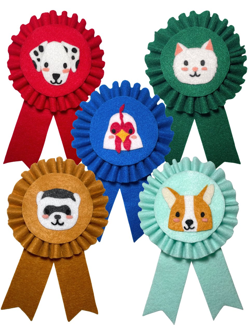 five award ribbons made out of felt material with dogs faces on them. blue ribbon with a husky. green ribbon with a spaniel. gold ribbon with a french bulldog. red ribbon with a dalmatian. mint green ribbon with a corgi.